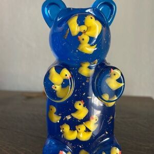 Blue Bear Sculpture with Yellow Ducks